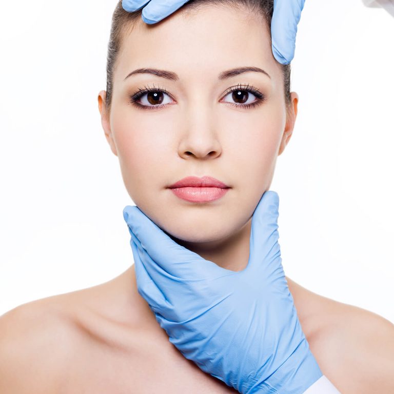 plastic-surgery-touching-beautiful-woman-face-isolated-white plastic-surgery-touching-beautiful-woman-face-isolated-white
